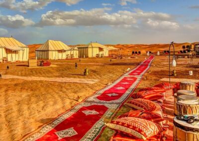 Desert Camp Morocco at Erg Chebbi Dunes with luxury tents and panoramic desert views