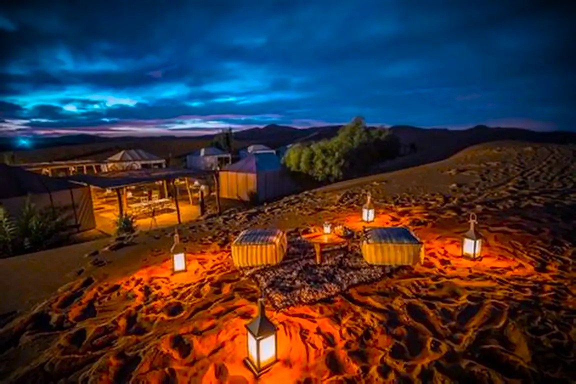 Desert Camp Morocco in Merzouga with luxury tents and golden sunset over Sahara dunes Desert Camp Morocco – Merzouga Sunset Experience