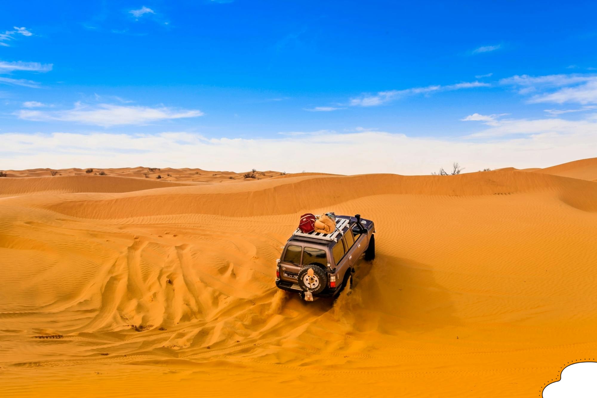 Driving across the iconic Erg Chebbi dunes during an Off-Road 4x4 Adventure in the Sahara Desert