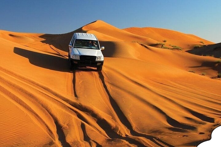 Watching a breathtaking sunset during an Off-Road 4x4 Adventure in the Sahara Desert