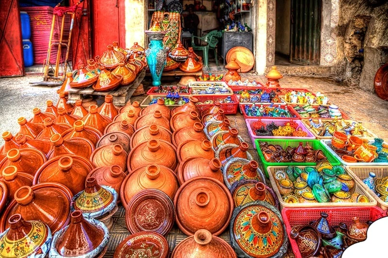 Handcrafted leather goods in a Moroccan souk for Moroccan Souks Shopping Guide.